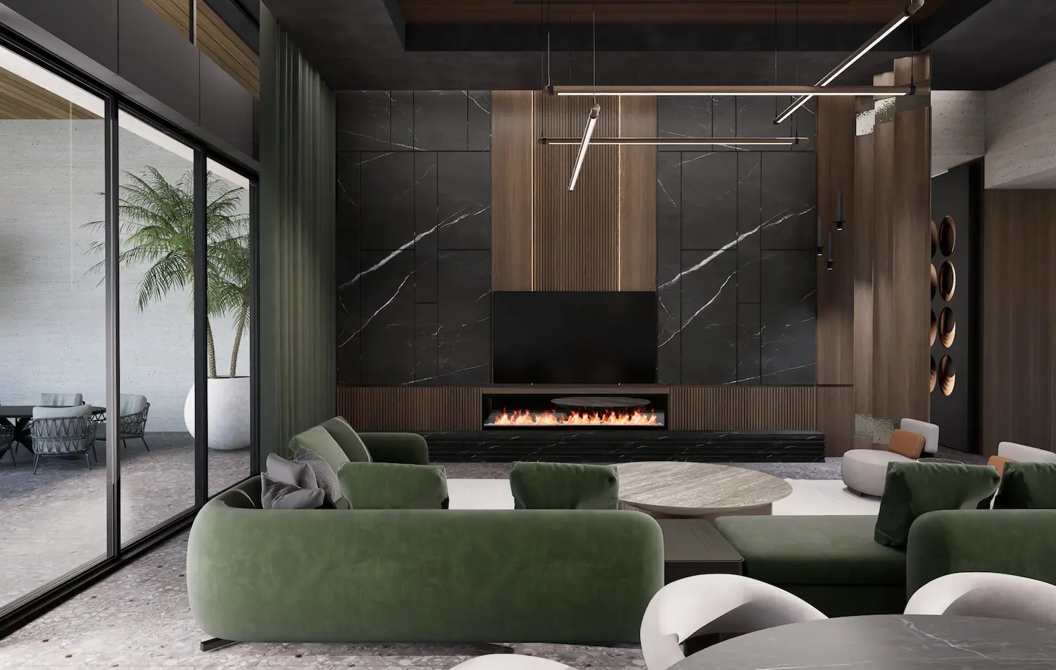 A luxury living room featuring a curved emerald green velvet sectional sofa, a black marble and wood-paneled media wall with an integrated linear fireplace, and floor-to-ceiling glass doors leading to a terrace with a palm tree.