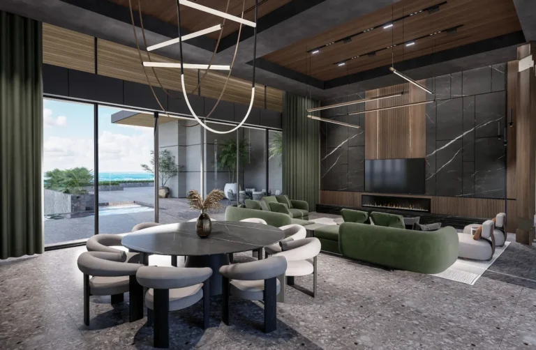 A vast living area with a round black marble dining table, green velvet sofas, and a terrace overlooking the sea.